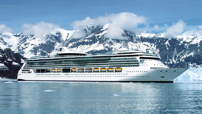 Cruise ship in front of Alaska mountains