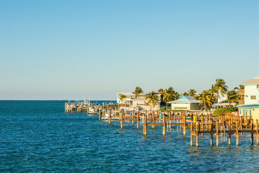 Waterfront homes and a dock on calm Florida water